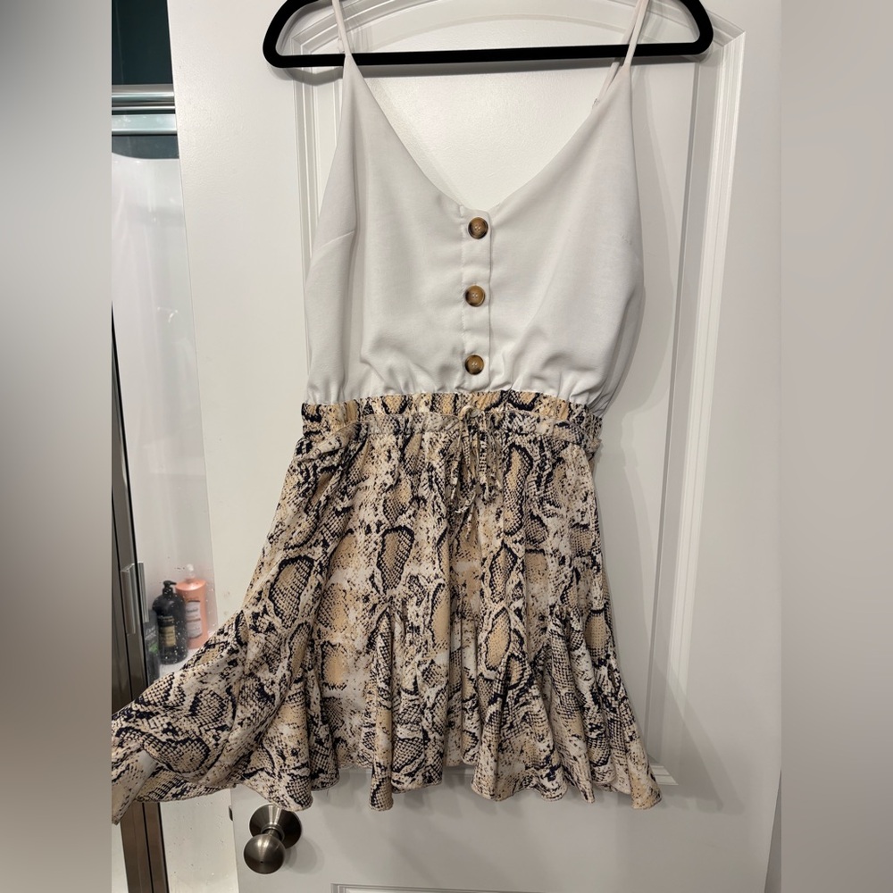 Boutique Chic White and Snake Print romper with Button Detail